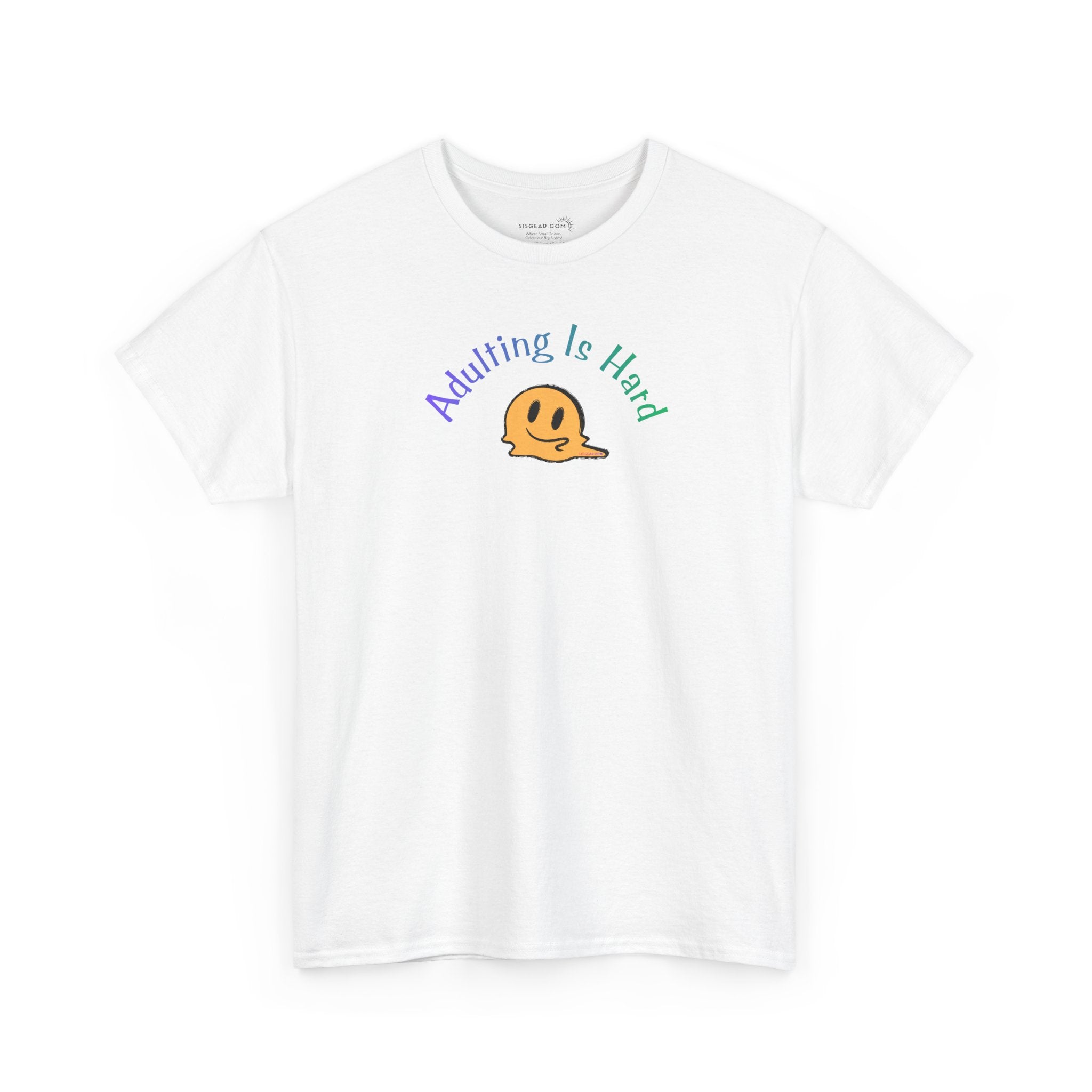 White Gildan Unisex 100% Heavy Cotton soft t-shirt, with smiley face graphic and text "Adulting is Hard"