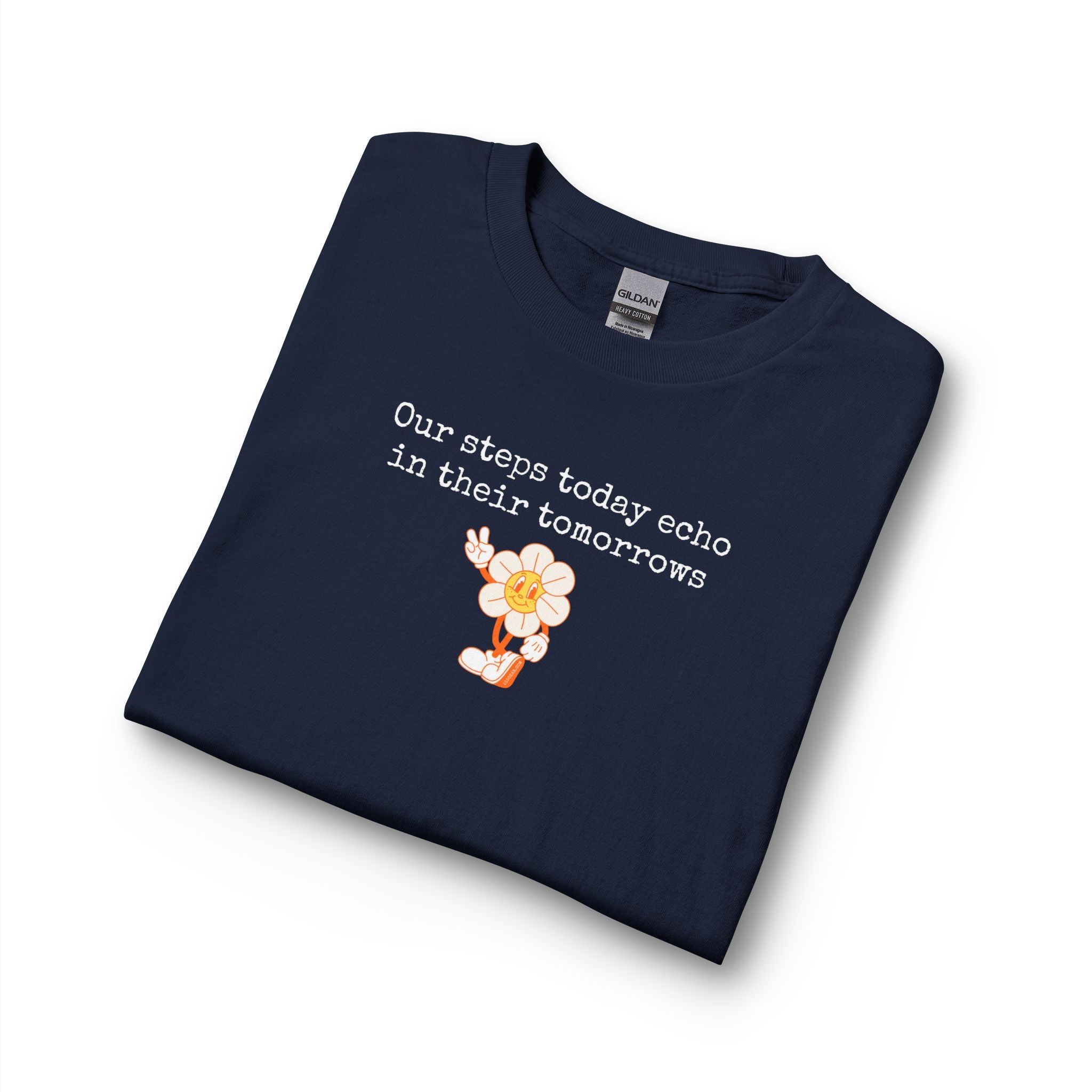 Folded navy blue long sleeve t-shirt with a sunflower design and text "our steps today echo in their tomorrows"