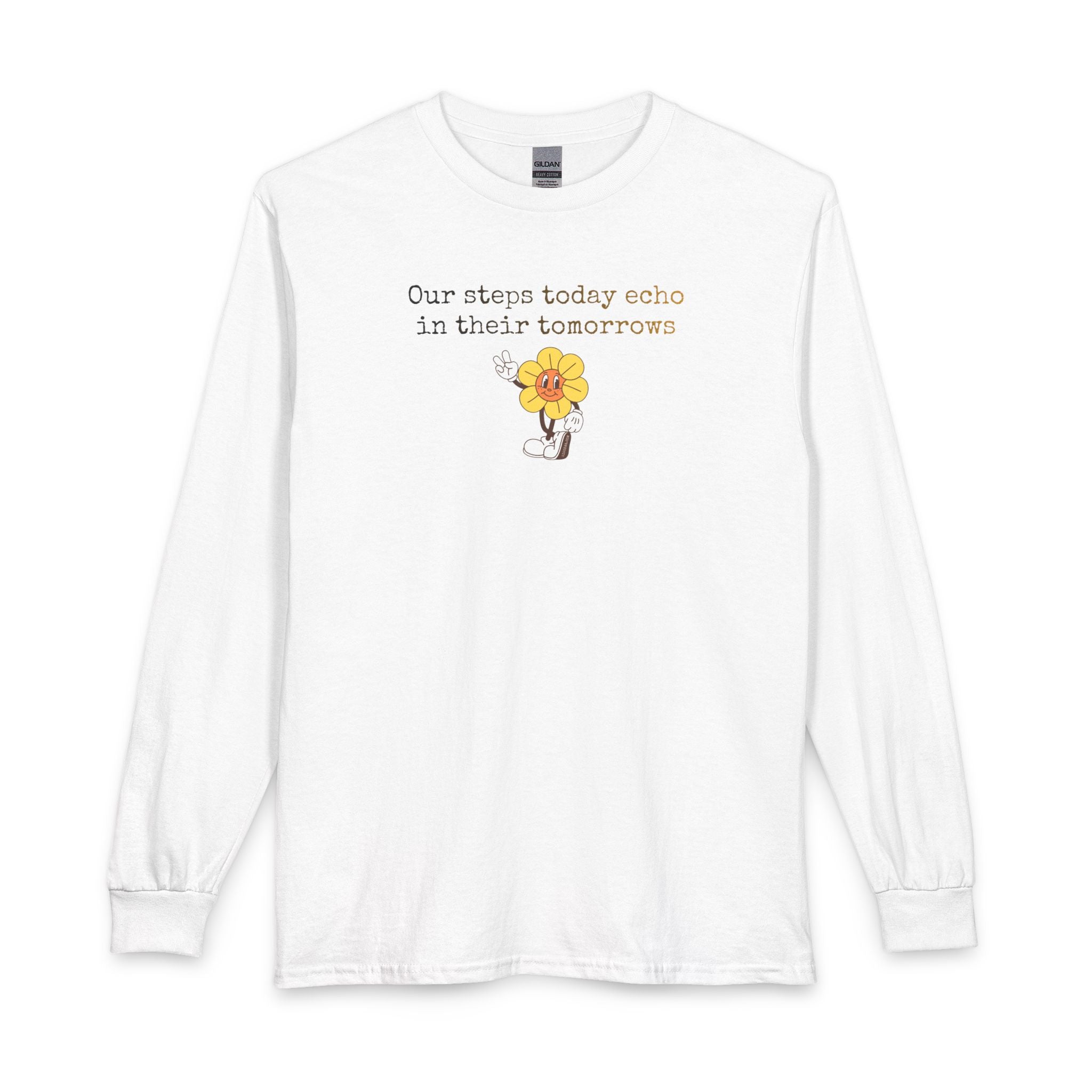 White long sleeve t-shirt with a sunflower design and text "our steps today echo in their tomorrows"