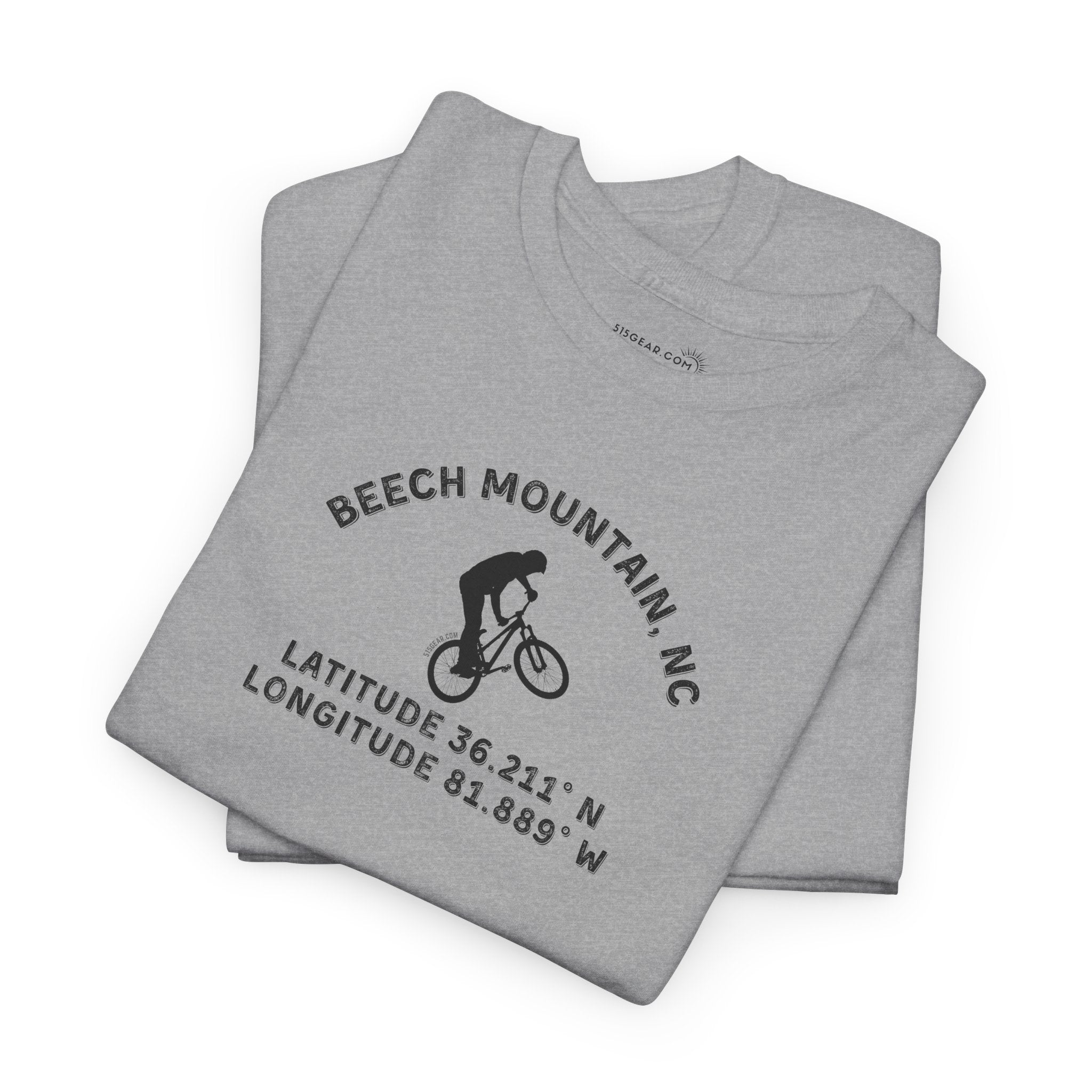 Folded gray t-shirt with mountain bike graphic and text "Beech Mountain, NC" along with Latitude and Longitude" coordinates