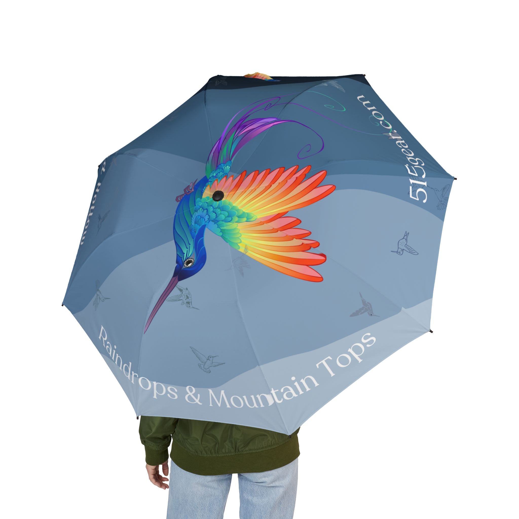 Umbrella with a colorful hummingbird design and text "hummingbird hollow Raindrops & Mountaintops" by 515Gear.com