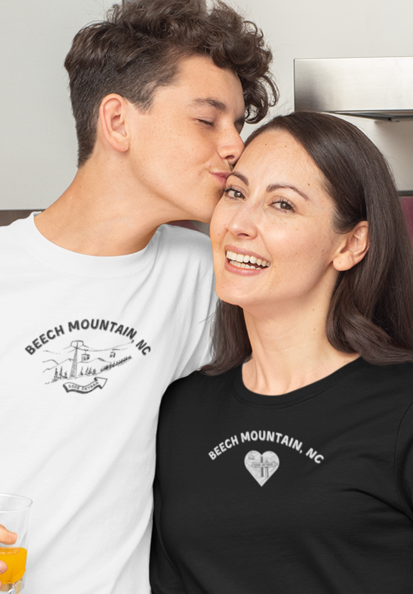 Two people wearing comfort color long-sleeve t-shirts with text 'Beech Mountain, NC - 5506 Skybar'