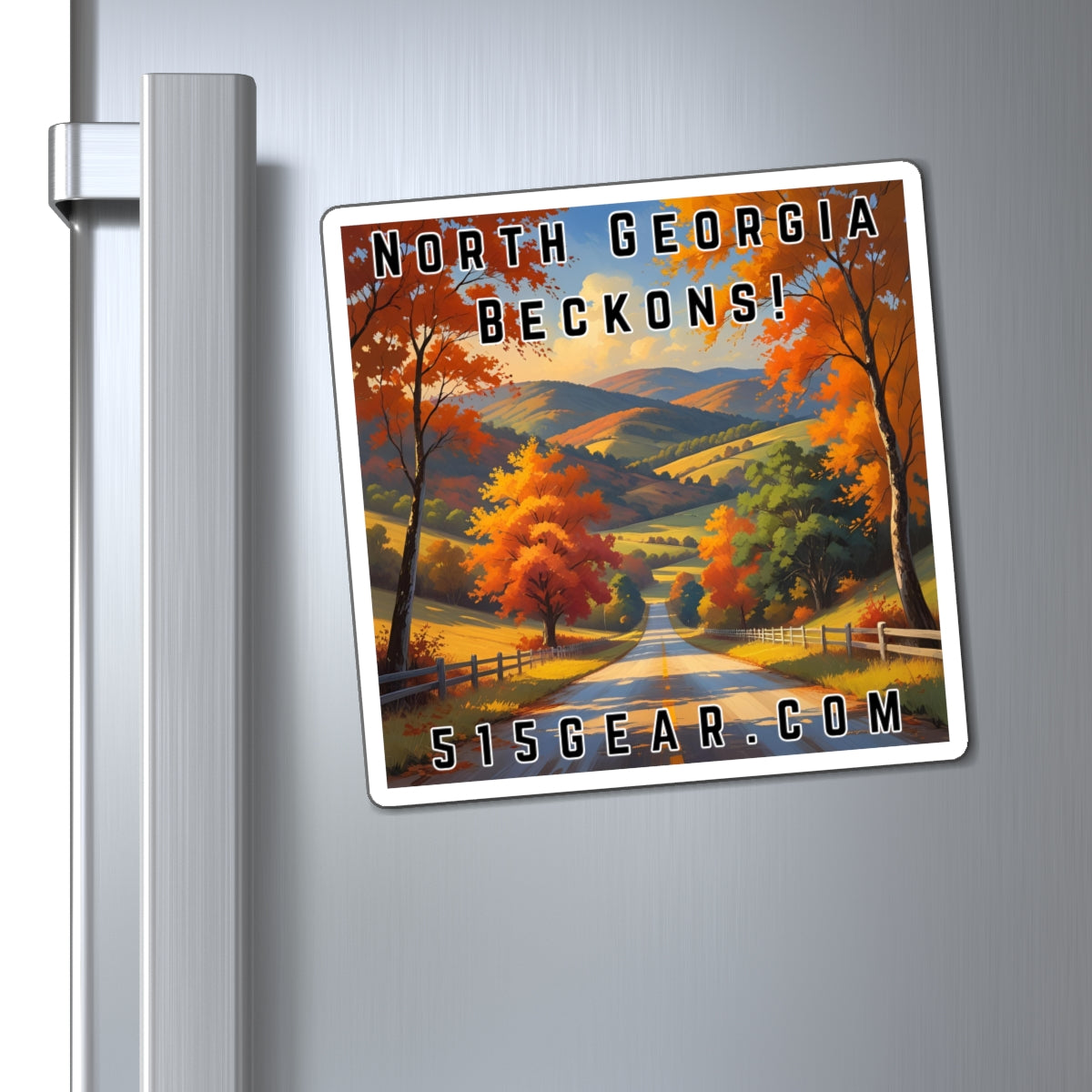 Fridge Magnet with a visual of a Road through a scenic Autumn / Fall landscape with trees and mountains, featuring text 'North Georgia Beckons!' by 515Gear.com