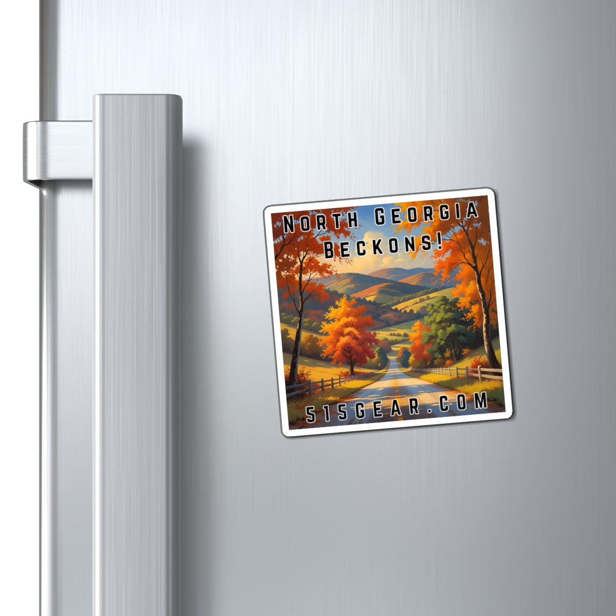 Fridge Magnet with a visual of a Road through a scenic Autumn / Fall landscape with trees and mountains, featuring text 'North Georgia Beckons!' by 515Gear.com