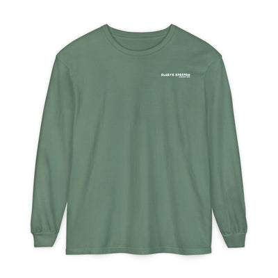 Green long-sleeve shirt with a cartoon Sparty peeing and text Always Spartan