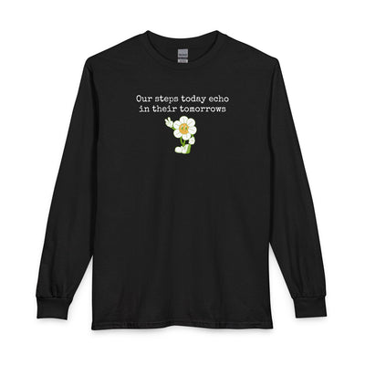 Black long sleeve t-shirt with a sunflower design and text "our steps today echo in their tomorrows"