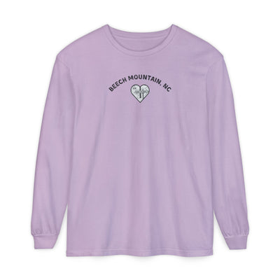 Lavender Comfort Colors® long-sleeve tee with a heart-shaped illustration of Beech Mountain’s slopes, chairlift, and sign pointing to 5506 Skybar 