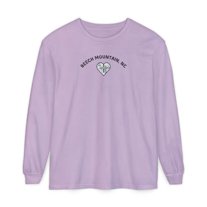 Lavender Comfort Colors® long-sleeve tee with a heart-shaped illustration of Beech Mountain’s slopes, chairlift, and sign pointing to 5506 Skybar 