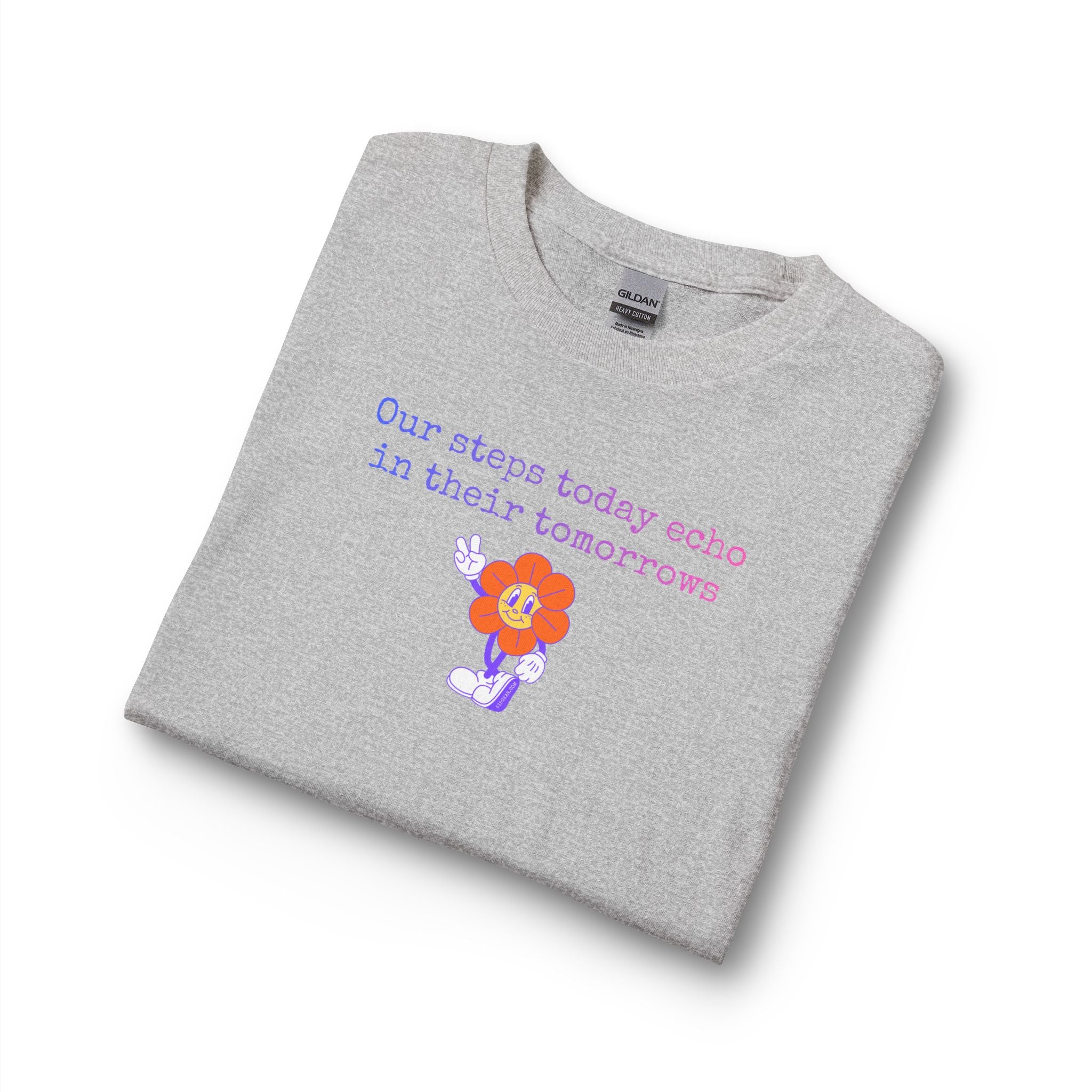 Folded gray long sleeve t-shirt with a sunflower design and text "our steps today echo in their tomorrows"