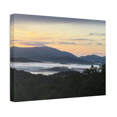 Surreal misty mountain sunrise in the blue ridge mountains canvas wall print on a white wall