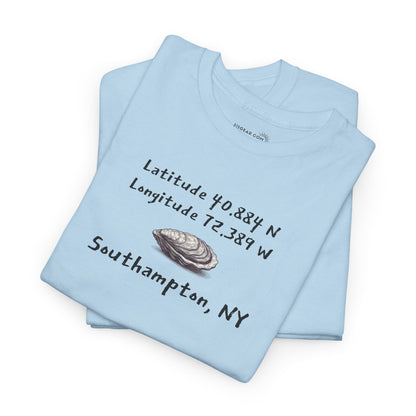 Light blue folded t-shirt with oyster graphic and text "latitude and longitude - Southampton NY"