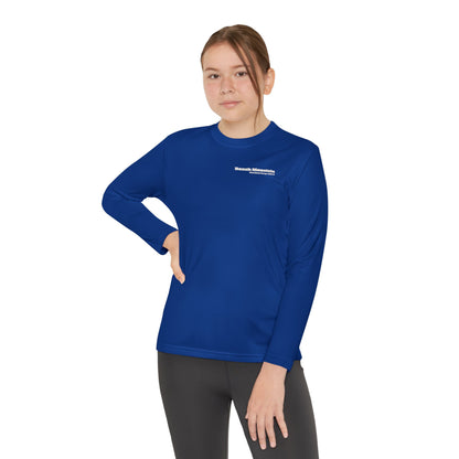 Girl wearing a blue long-sleeve performance t-shirt text "Little Ripper – Beech Mountain... Vertical Drop 830 ft" with snowboard graphic