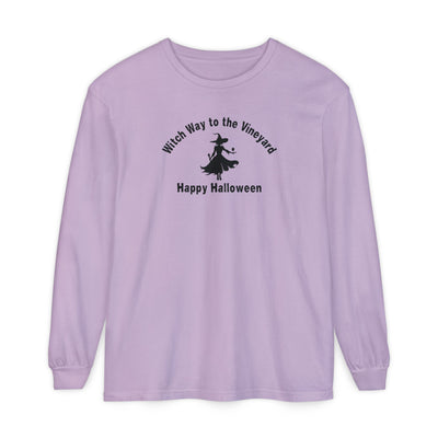 Purple long-sleeve unisex comfort color t-shirt with halloween witch graphic holding a wine glass  and text "Witch Way to the Vineyard - Happy Halloween" 