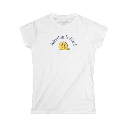 White super soft v-neck Women's t-shirt with text Adulting is Hard and graphic of a melting smiley face