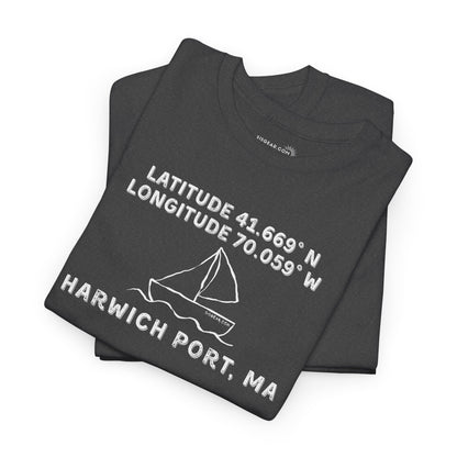 Folded black t-shirt with text "Latitude 41.669 N Longitude 70.058 W - Harwich Port, MA" and sailboat graphic