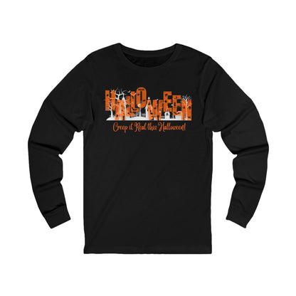 Black unisex long sleeve t-shirt with halloween graphic of a cemetery and larger text "Halloween" and small text "Creep It Real This Halloween" by 515Gear.com 