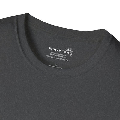 Dark gray t-shirt with a brand logo and text on the collar against a white background