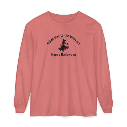 Rose long-sleeve unisex comfort color t-shirt with halloween witch graphic holding a wine glass  and text "Witch Way to the Vineyard - Happy Halloween" 