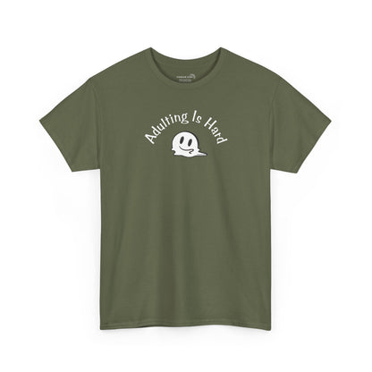 Green Gildan Unisex 100% Heavy Cotton soft t-shirt, with smiley face graphic and text "Adulting is Hard"