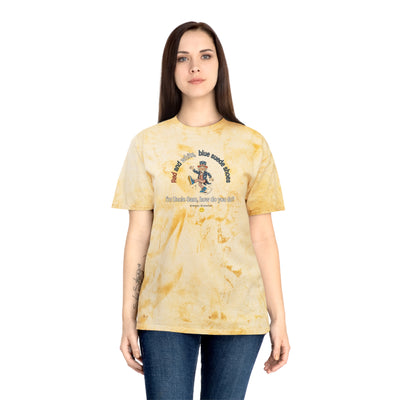Woman wearing a tie-dye t-shirt with Uncle Sam dancing and text "Red and White, Blue Suede Shoes..." 