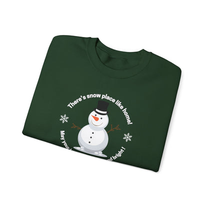 Folded green shirt with a snowman design and text saying There's snow place like home!  May your holidays be merry and bright! by 515Gear.com
