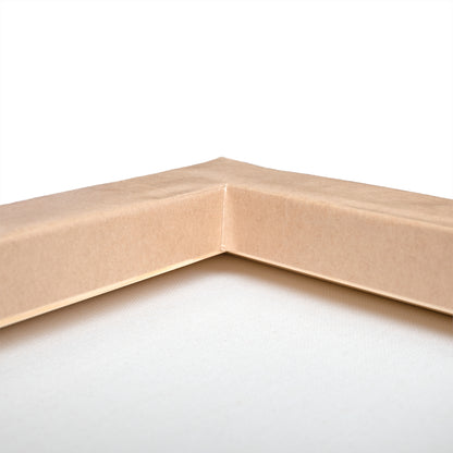 Close-up of a corner of a cardboard box on a white background