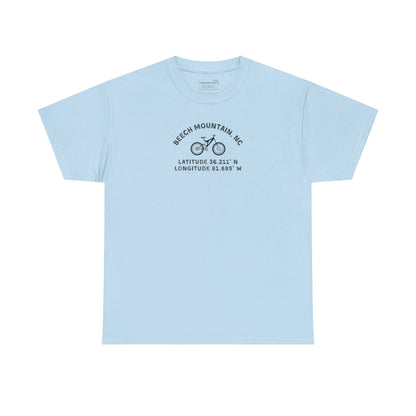 Light blue t-shirt with mountain bike graphic and text "Beech Mountain, NC - Latitude and Longitude" coordinates