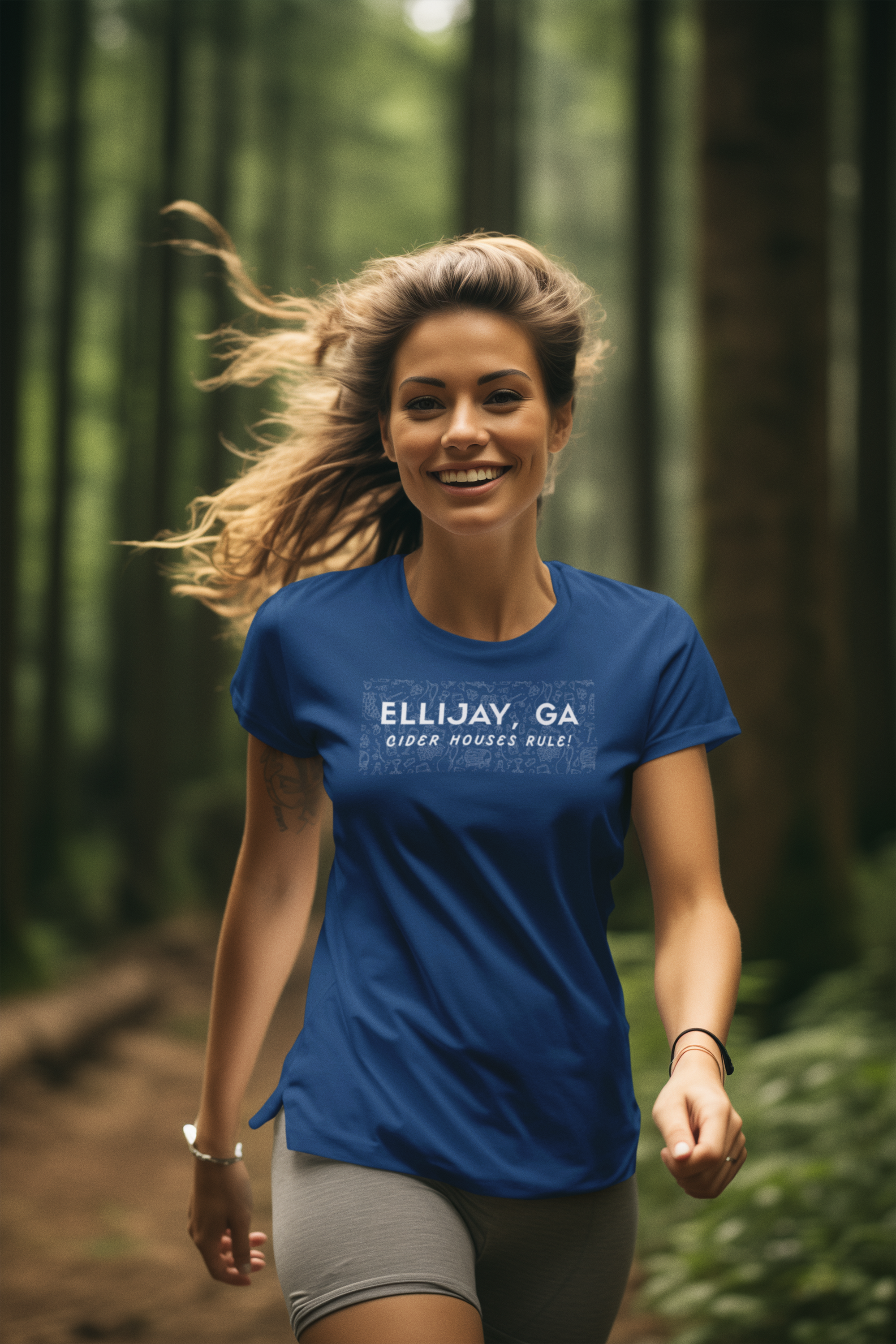 Woman in a forest wearing a blue Ellijay, GA t-shirt Cider Houses Rule | by 515Gear.com | Orchard lifestyle 