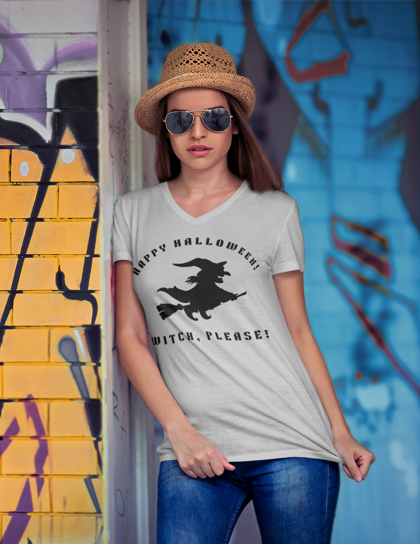 Woman's Halloween T-shirt in front of a colorful graffiti wall by 515Gear.com, Witch Please!