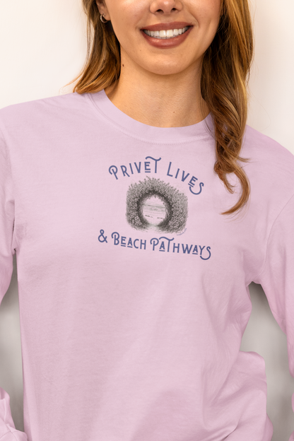 Woman wearing a purple unisex Comfort Colors® long‑sleeve tee with beach graphic and text "Privet Lives & Beach Pathways"