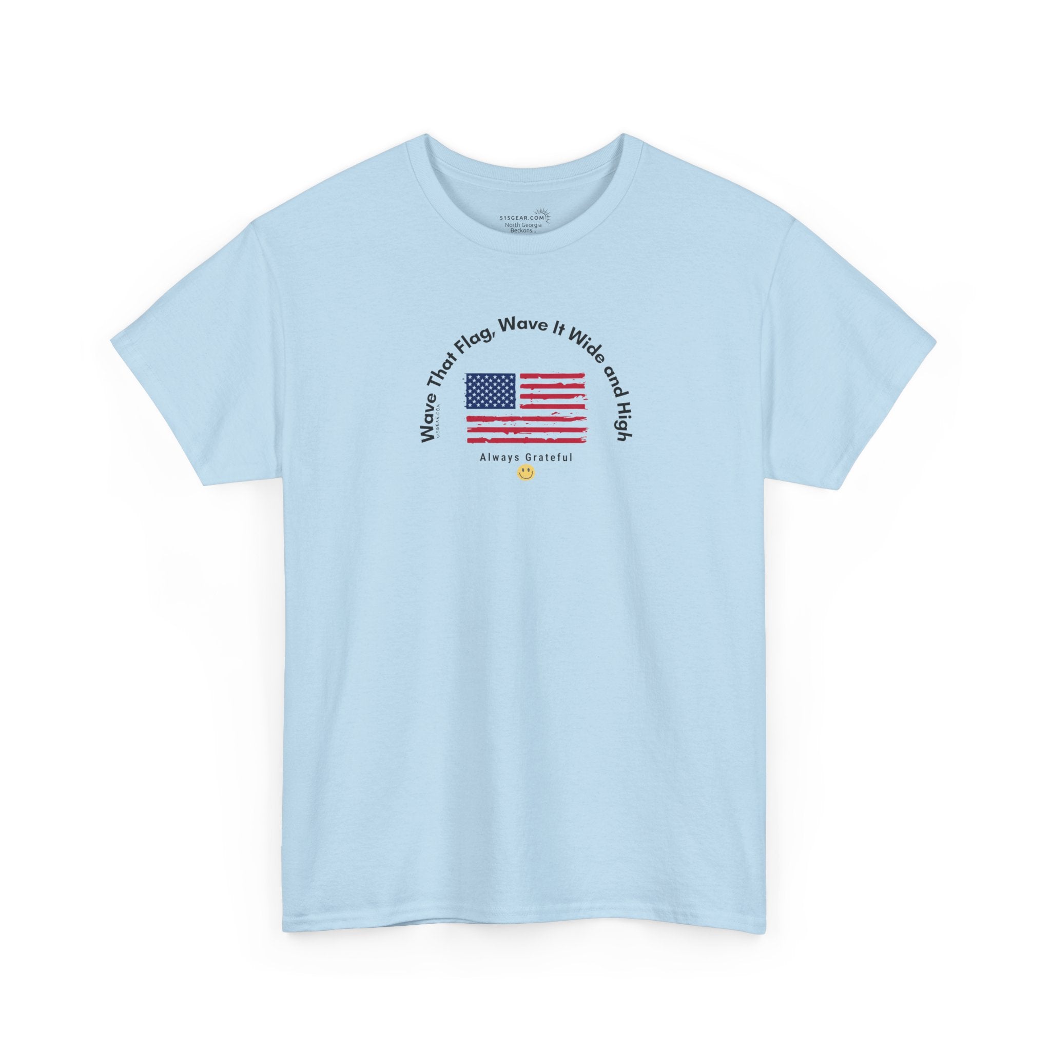 Light blue t-shirt with American flag graphic and text "Wave That Flag, Wave It Wide and High"