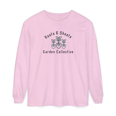 Pink long-sleeve shirt with 'Roots & Shoots Garden Collective' logo on a white background