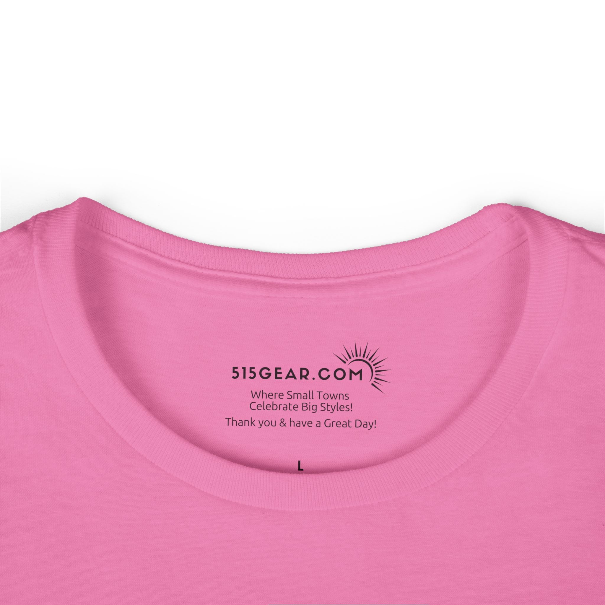 Close-up of a pink shirt with '515Gear.com' branding on a white background