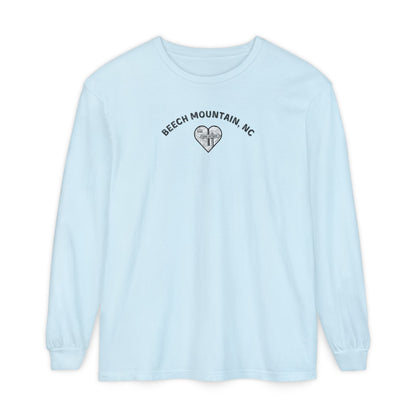 Light blue Comfort Colors® long-sleeve tee with a heart-shaped illustration of Beech Mountain’s slopes, chairlift, and sign pointing to 5506 Skybar 