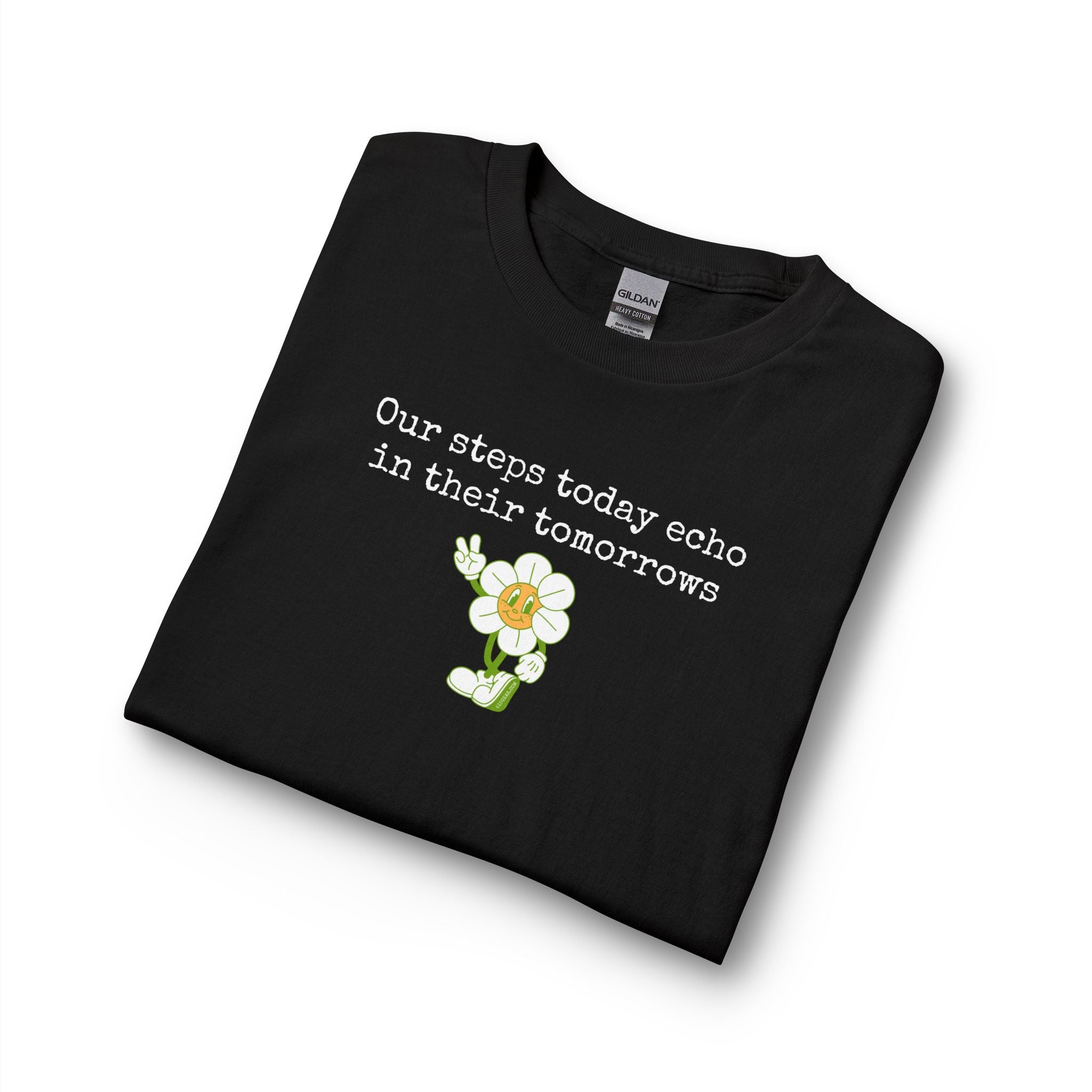 Black long sleeve t-shirt with a sunflower design and text "our steps today echo in their tomorrows"