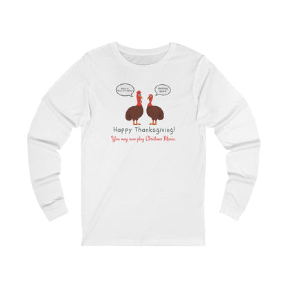 White long-sleeve tee with two cartoon turkeys and text "what is farm-to-table... Nothing good... Happy Thanksgiving!  You may now play Christmas music"