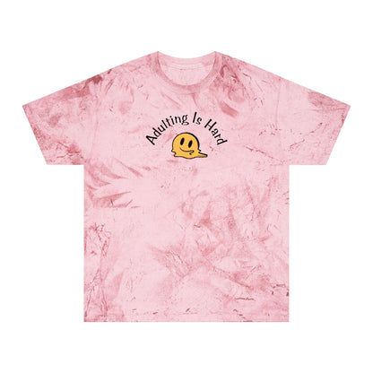 Pink tie-dye Comfort Colors 1745 unisex color blast t-shirt, 100% ring-spun cotton, with melting smiley face and text "Adulting is Hard"