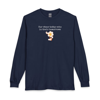Navy blue long sleeve t-shirt with a sunflower design and text "our steps today echo in their tomorrows"