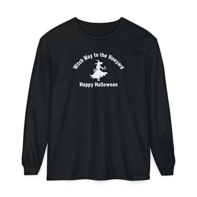 Black long-sleeve unisex comfort color t-shirt with halloween witch graphic holding a wine glass  and text "Witch Way to the Vineyard - Happy Halloween" 