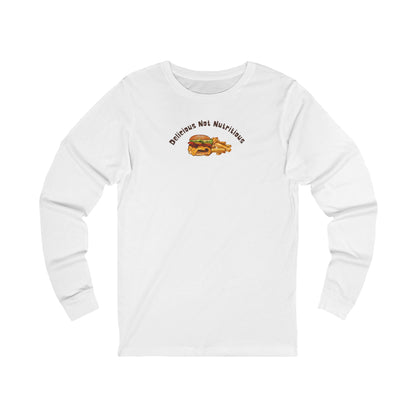 White long-sleeve shirt with cheeseburger and fries graphic and text 'Delicious Not Nutritious'
