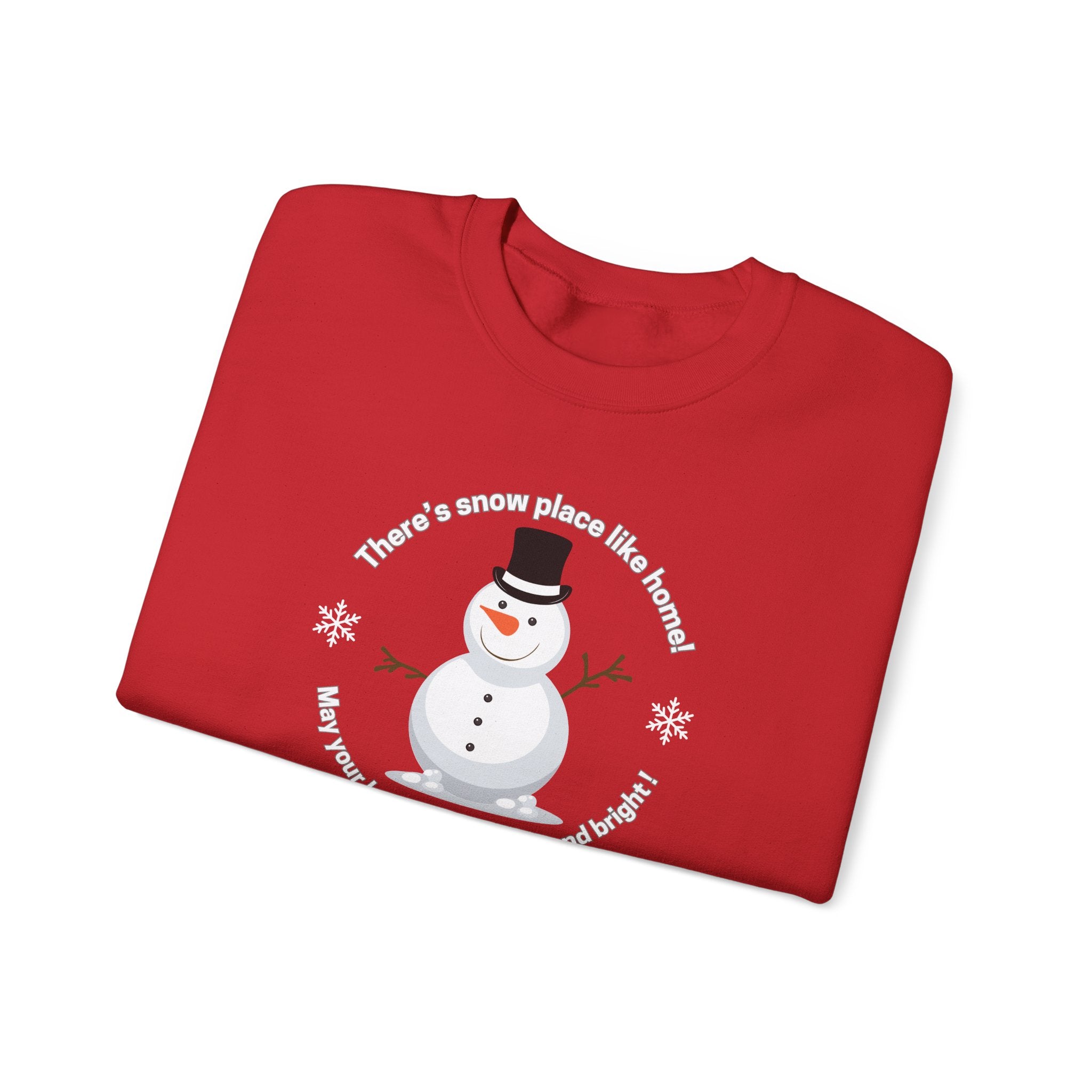 Folded red shirt with a snowman design and text saying There's snow place like home!  May your holidays be merry and bright! by 515Gear.com