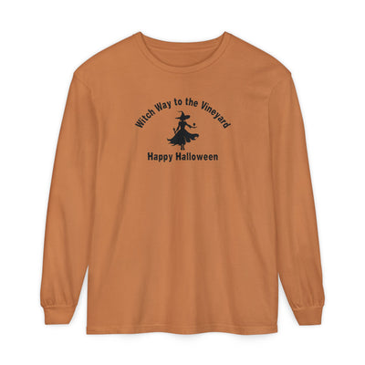 Rust long-sleeve unisex comfort color t-shirt with halloween witch graphic holding a wine glass  and text "Witch Way to the Vineyard - Happy Halloween" 