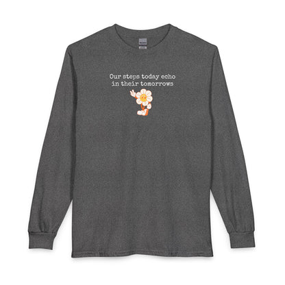 Gray long sleeve t-shirt with a sunflower design and text "our steps today echo in their tomorrows"