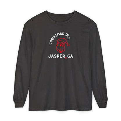 Black long-sleeve shirt with happy Santa and candy cane graphic and text "Christmas in... Jasper, GA"