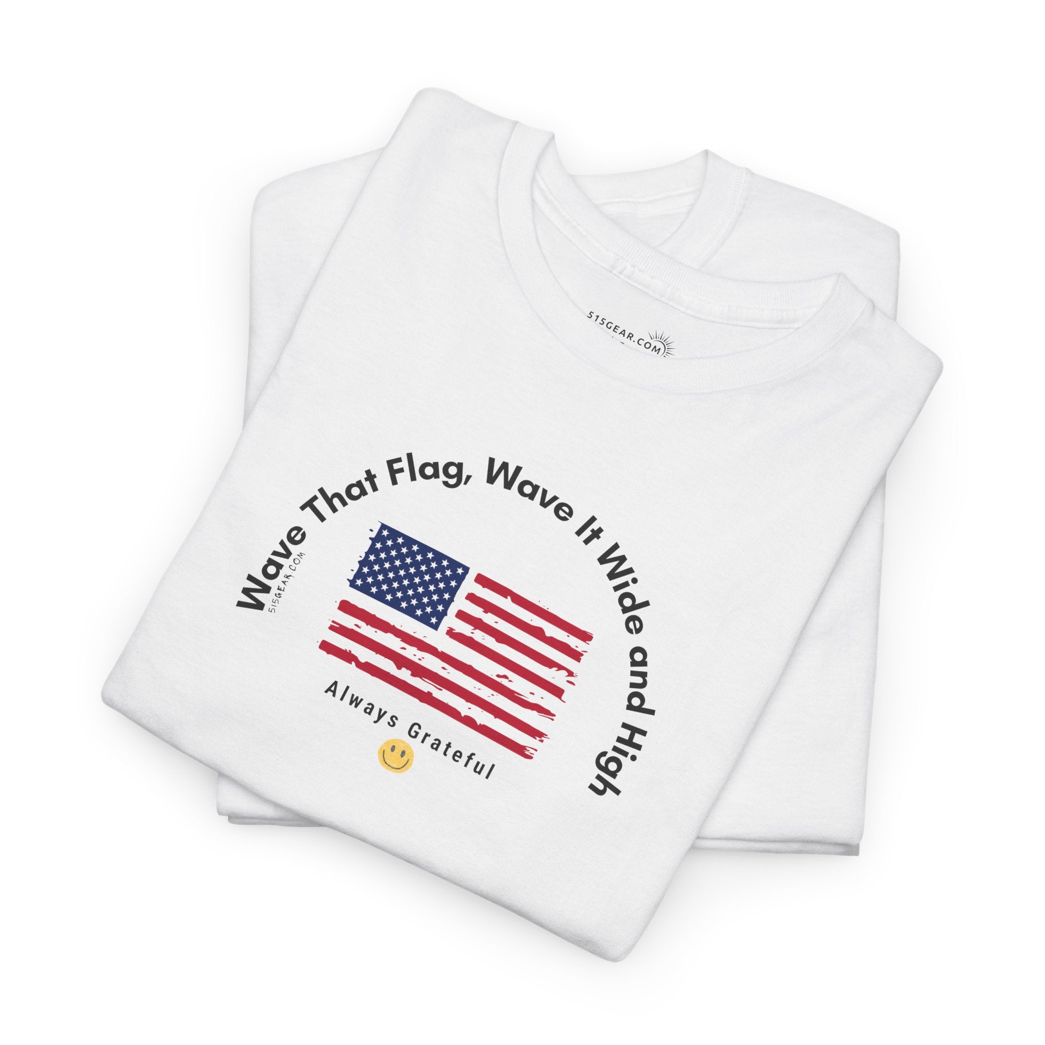 White t-shirt with American flag graphic and text "Wave That Flag, Wave It Wide and High"