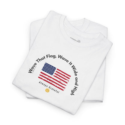 White t-shirt with American flag graphic and text "Wave That Flag, Wave It Wide and High"