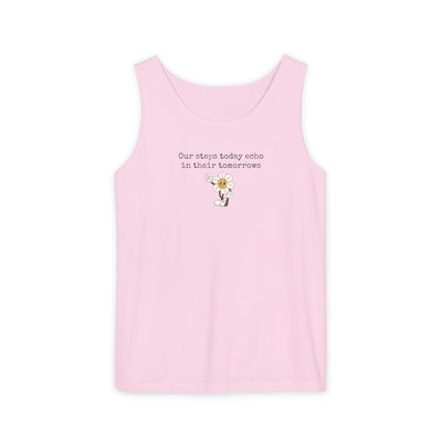 Pink tank top with text "Our steps today echo in their tomorrows" and anthropomorphic hippy flower graphic