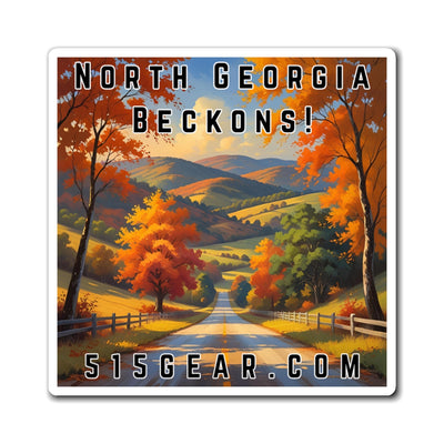 Fridge Magnet with a visual of a Road through a scenic Autumn / Fall landscape with trees and mountains, featuring text 'North Georgia Beckons!' by 515Gear.com