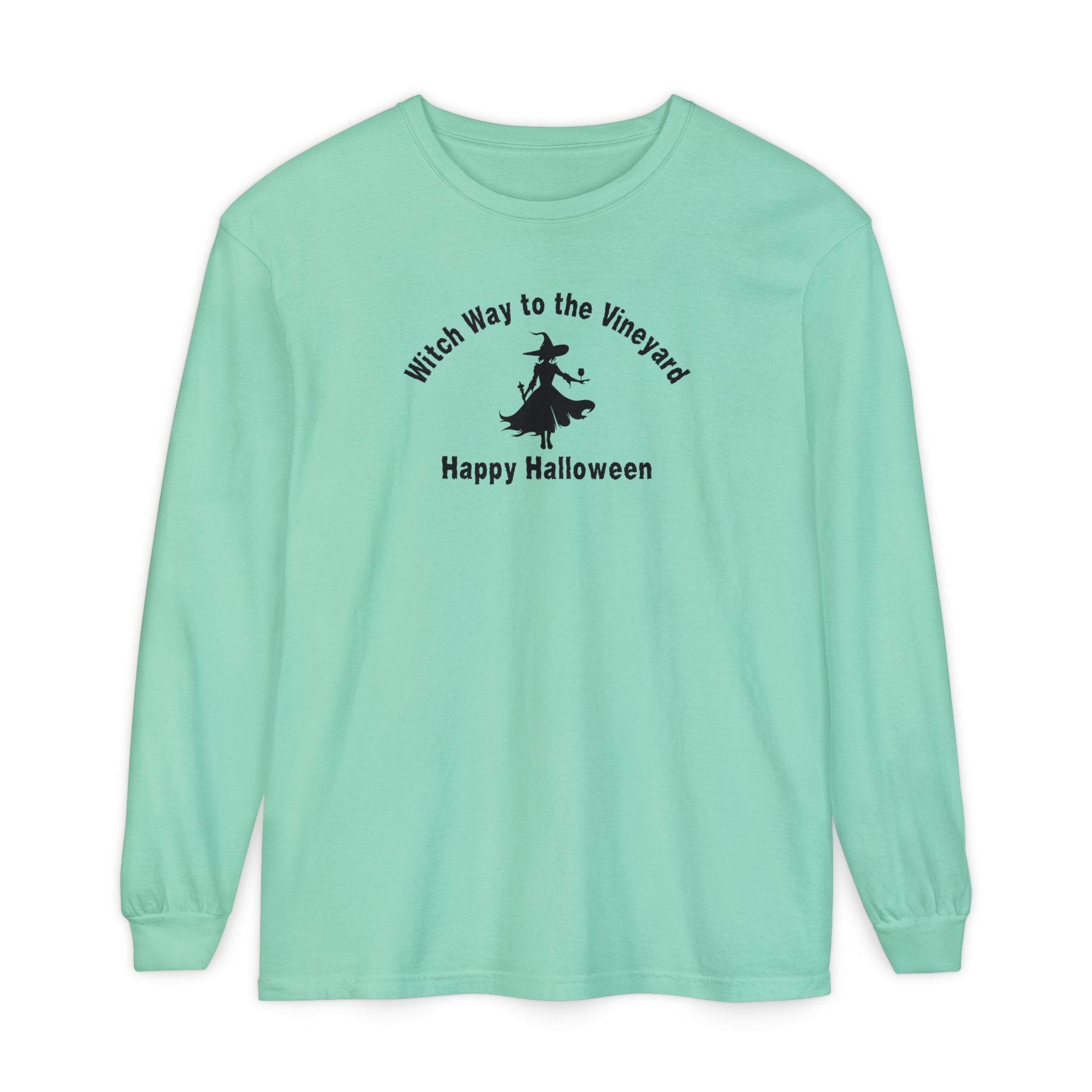 Mint long-sleeve unisex comfort color t-shirt with halloween witch graphic holding a wine glass  and text "Witch Way to the Vineyard - Happy Halloween" 