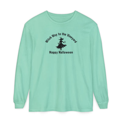 Mint long-sleeve unisex comfort color t-shirt with halloween witch graphic holding a wine glass  and text "Witch Way to the Vineyard - Happy Halloween" 